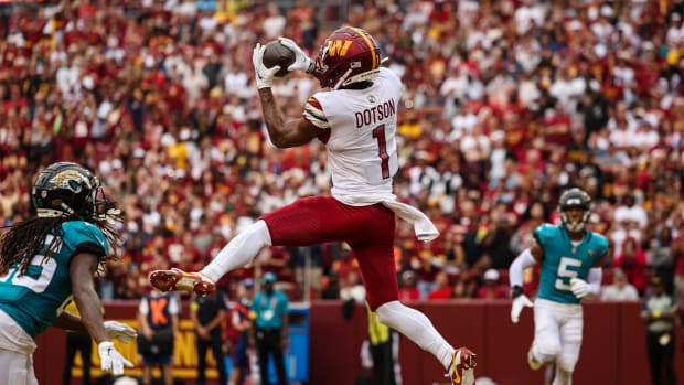 Washington Commanders receiver Jahan Dotson (1) catches his first career touchdown against the Jacksonville Jaguars.